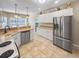 Spacious kitchen features stainless steel appliances and ample counter space, perfect for cooking at 8209 Governors Walk, North Charleston, SC 29418