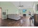 Spacious living room with hardwood floors, vaulted ceiling, fireplace, and comfortable seating at 8209 Governors Walk, North Charleston, SC 29418