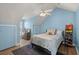 Bedroom with sloped ceilings and cozy decor with a patterned blue rug at 8696 Spring Chapel Ln, North Charleston, SC 29420