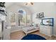 Bright bedroom featuring a large window, vaulted ceiling, and hardwood floors at 8696 Spring Chapel Ln, North Charleston, SC 29420