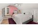 Charming bedroom with sloped ceilings, a plush rug, and playful decorations at 8696 Spring Chapel Ln, North Charleston, SC 29420
