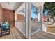 Comfortable front porch with seating, perfect for relaxing and enjoying the neighborhood views at 8696 Spring Chapel Ln, North Charleston, SC 29420