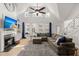 Bright living room with lots of natural light, high ceilings, and fireplace at 8696 Spring Chapel Ln, North Charleston, SC 29420