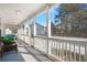Inviting screened porch with comfortable seating, offering a relaxing outdoor living space at 8696 Spring Chapel Ln, North Charleston, SC 29420