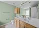 Bathroom featuring double vanity with a soaking tub and walk-in shower at 9021 Robins Nest Way, Summerville, SC 29485