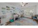 Inspiring bedroom featuring desk space, neutral colors, wood floors and wall art at 9021 Robins Nest Way, Summerville, SC 29485