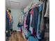 Walk-in closet with shelving and ample storage space for clothes and shoes at 9021 Robins Nest Way, Summerville, SC 29485