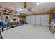 Spacious two-car garage with ample storage and a clean, finished floor at 9021 Robins Nest Way, Summerville, SC 29485