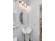 Bathroom sink and vanity with mirror, cabinet, and light fixture at 9207 Bowen Corner Ave, Hanahan, SC 29410