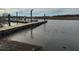 Scenic view of a community dock on the water with a boat launch and cloudy sky at 9207 Bowen Corner Ave, Hanahan, SC 29410