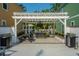 Outdoor community grilling area with picnic tables and BBQ grills for resident gatherings at 9207 Bowen Corner Ave, Hanahan, SC 29410