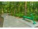 Lush, wooded community walking path featuring exercise benches along paved trail at 9207 Bowen Corner Ave, Hanahan, SC 29410