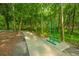 Scenic walking path featuring exercise equipment in a lush wooded community at 9207 Bowen Corner Ave, Hanahan, SC 29410
