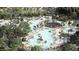 Stunning aerial view of the community waterpark and resort-style amenities, perfect for a fun-filled vacation at 1010 Swamp Rose Run, Summerville, SC 29485