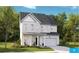Charming two-story home with a welcoming front porch and a two-car garage, perfect for suburban living at 1010 Swamp Rose Run, Summerville, SC 29485