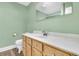 Bathroom featuring a wooden vanity with drawers, a toilet, a sink, and a mirror at 106 Two Wood Ct, Summerville, SC 29483