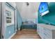Charming bedroom featuring light blue walls, wood floors, a TV, and natural light at 106 Two Wood Ct, Summerville, SC 29483