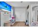 Bedroom with a view of a large TV screen, full length mirror, and closet at 106 Two Wood Ct, Summerville, SC 29483