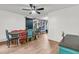 Charming dining area with colorful chairs and wood flooring at 106 Two Wood Ct, Summerville, SC 29483