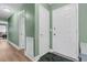 Inviting foyer with hardwood floors, leading to other rooms, and the front door at 106 Two Wood Ct, Summerville, SC 29483