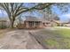 Charming brick home with yard, inviting curb appeal, and an attached two car garage at 106 Two Wood Ct, Summerville, SC 29483