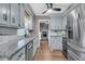 Updated kitchen with stainless steel appliances and gray cabinets at 106 Two Wood Ct, Summerville, SC 29483