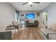 Inviting living room featuring hardwood floors, neutral color palette, and comfortable seating at 106 Two Wood Ct, Summerville, SC 29483