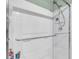 Modern shower featuring glass doors, white tiles, and a shower head at 106 Two Wood Ct, Summerville, SC 29483