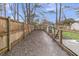 View of the side yard featuring a wooden fence, dog run and play equipment at 106 Two Wood Ct, Summerville, SC 29483