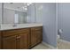 Bathroom with a white sink, grey walls, and a view into the shower toilet combo at 107 Diploma Dr, Ladson, SC 29485