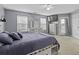 Spacious bedroom features neutral walls, complemented by white trim, creating a calm and inviting retreat at 107 Diploma Dr, Ladson, SC 29485