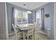 Inviting dining room with ample natural light and neutral tones, ideal for Gathering meals at 107 Diploma Dr, Ladson, SC 29485