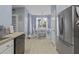 Charming dining area visible from the kitchen featuring a white table, chairs, and natural light at 107 Diploma Dr, Ladson, SC 29485
