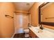 Cozy bathroom with a shower-tub combo, matching vanity, and updated fixtures at 109 Walnut Creek Rd, Charleston, SC 29414