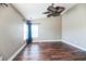 Bright bedroom featuring hardwood floors, a modern ceiling fan, and natural light at 109 Walnut Creek Rd, Charleston, SC 29414