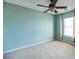 Bedroom with a ceiling fan, window, and a painted blue accent wall at 109 Walnut Creek Rd, Charleston, SC 29414