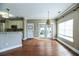 Bright living area with hardwood floors, direct access to kitchen and back patio at 109 Walnut Creek Rd, Charleston, SC 29414