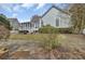 This lush backyard features a screened-in porch and a well-manicured lawn at 1106 Barfield St, Charleston, SC 29492