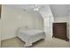Neutral bedroom with carpet, white bedding, dormer, and traditional decor at 1106 Barfield St, Charleston, SC 29492