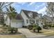 Beautiful home with an attached garage, well-kept landscaping, and a charming front porch at 1106 Barfield St, Charleston, SC 29492