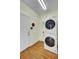 Functional laundry room with stacked washer and dryer units and storage at 1106 Barfield St, Charleston, SC 29492
