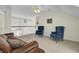 Upstairs landing with vaulted ceiling, carpet, and comfortable living area at 1106 Barfield St, Charleston, SC 29492