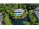Aerial view showcasing a luxurious community pool area surrounded by lush landscaping at 1204 Basildon Rd, Mount Pleasant, SC 29466