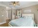 Relaxing bedroom with ceiling fan, calm decor, and convenient access to an ensuite bathroom at 1204 Basildon Rd, Mount Pleasant, SC 29466