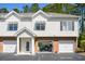 Charming home featuring attached garages, neutral siding, and well-maintained brick accents at 1204 Basildon Rd, Mount Pleasant, SC 29466
