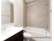 Bathroom featuring a tiled shower/tub combo, dark wood vanity, and neutral wall color at 1233 Homecoming Blvd # Cc2-1-34, Ravenel, SC 29470