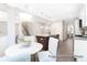 Open kitchen with granite countertops, kitchen island and dining area at 1233 Homecoming Blvd # Cc2-1-34, Ravenel, SC 29470