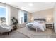 Bright main bedroom with ample natural light, neutral tones, and elegant furnishings at 1233 Homecoming Blvd # Cc2-1-34, Ravenel, SC 29470