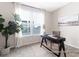 Well-lit office space with a large window, modern desk, and minimalist decor at 1233 Homecoming Blvd # Cc2-1-34, Ravenel, SC 29470