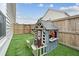 Cozy backyard featuring a playhouse with a fenced green space at 127 Oyster Tide Ave, Summerville, SC 29485